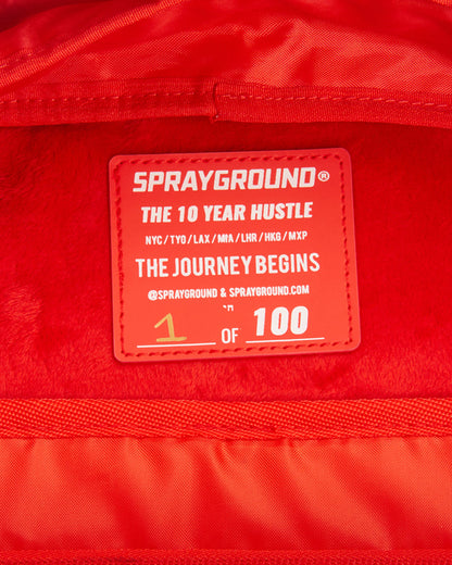 THE 10 YEAR HUSTLE BACKPACK. MYSTERY BOX. NUMBERED 1 OF 100